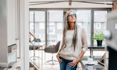 woman-with-long-grey-hair-in-kitchen-looking-up-2022-11-06-22-48-46-utc.jpg